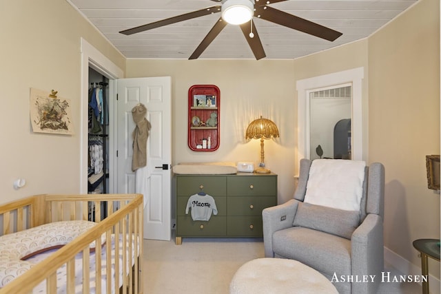 5615 Egypt Valley Ave NE, Belmont, MI 49306 - bedroom featuring a crib, light carpet, a ceiling fan, and wooden ceiling