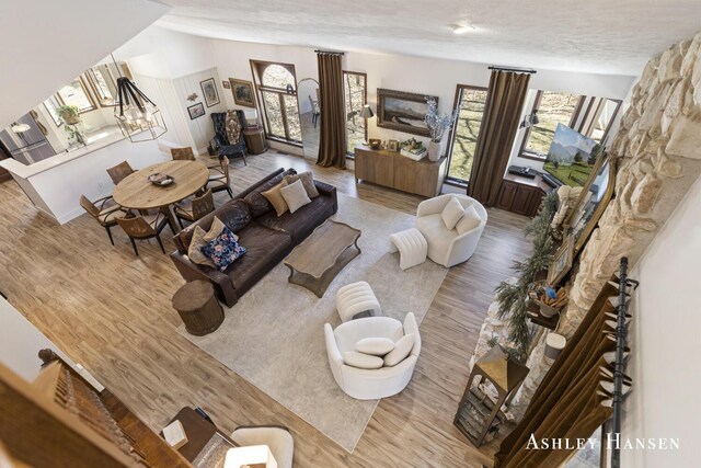 5615 Egypt Valley Ave NE, Belmont, MI 49306 - living room featuring wood finished floors