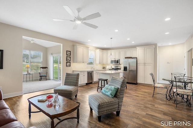 1549 Center Hill Rd SE Unit 37, Lowell, MI 49331 - living room with ceiling fan, dark wood-style floors, baseboards, and recessed lighting