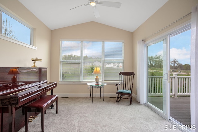 1549 Center Hill Rd SE Unit 37, Lowell, MI 49331 - living area featuring healthy amount of natural light, a ceiling fan, vaulted ceiling, light carpet, and baseboards