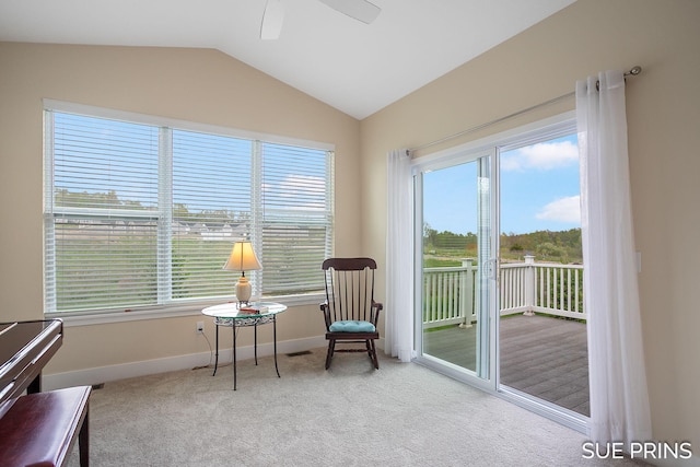 1549 Center Hill Rd SE Unit 37, Lowell, MI 49331 - sitting room featuring vaulted ceiling, baseboards, a ceiling fan, and carpet flooring
