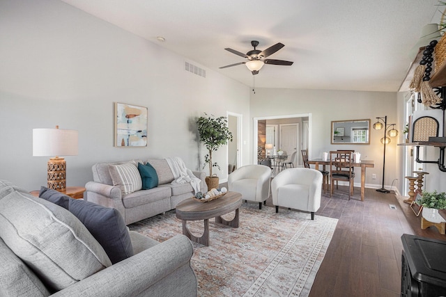 6010 Long Lake Rd, Berrien Springs, MI 49103 - living room with visible vents, hardwood / wood-style floors, baseboards, a ceiling fan, and vaulted ceiling