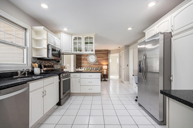 6010 Long Lake Rd, Berrien Springs, MI 49103 - kitchen featuring backsplash, a sink, a peninsula, stainless steel appliances, and recessed lighting