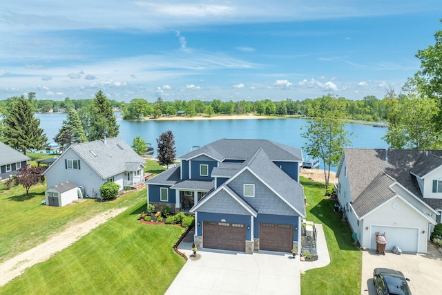 7140 Holiday Dr, Canadian Lakes, MI 49346 - birds eye view of property with a water view and a residential view