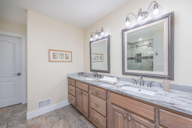 7140 Holiday Dr, Canadian Lakes, MI 49346 - bathroom with a sink, visible vents, baseboards, and a shower stall