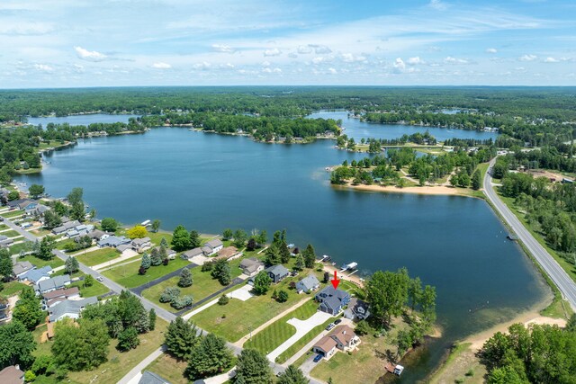 7140 Holiday Dr, Canadian Lakes, MI 49346 - bird's eye view with a water view and a residential view
