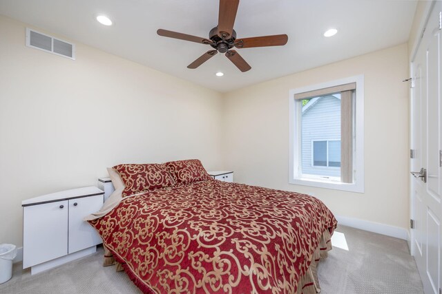 7140 Holiday Dr, Canadian Lakes, MI 49346 - bedroom with baseboards, light carpet, recessed lighting, visible vents, and ceiling fan