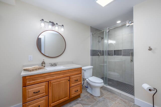 7140 Holiday Dr, Canadian Lakes, MI 49346 - bathroom with toilet, vanity, and a shower stall