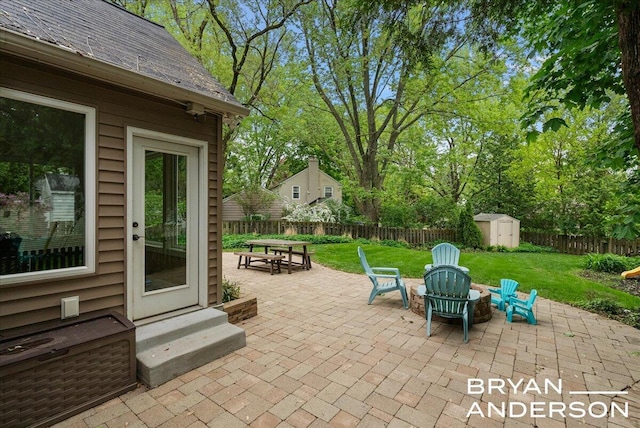 2120 Englewood Dr SE, East Grand Rapids, MI 49506 - view of patio / terrace featuring an outdoor fire pit