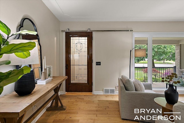 2120 Englewood Dr SE, East Grand Rapids, MI 49506 - entrance foyer with light wood-style flooring and baseboards