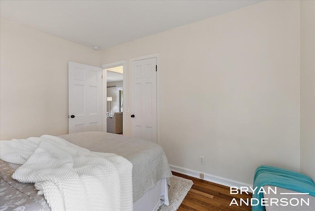2120 Englewood Dr SE, East Grand Rapids, MI 49506 - bedroom featuring wood finished floors and baseboards
