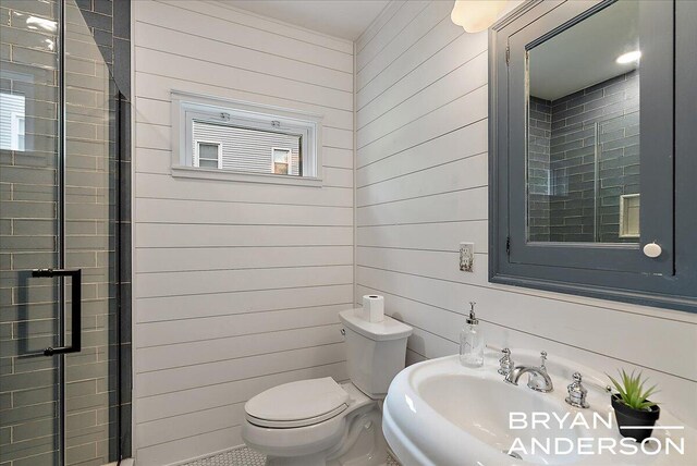 2120 Englewood Dr SE, East Grand Rapids, MI 49506 - bathroom featuring toilet and wood walls