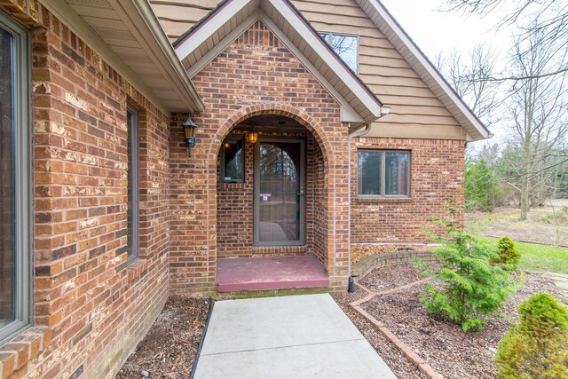 9675 Nabozny Dr, Milan, MI 48160 - view of exterior entry with brick siding