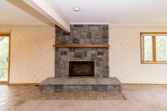 9675 Nabozny Dr, Milan, MI 48160 - room details featuring crown molding, baseboards, a stone fireplace, and visible vents