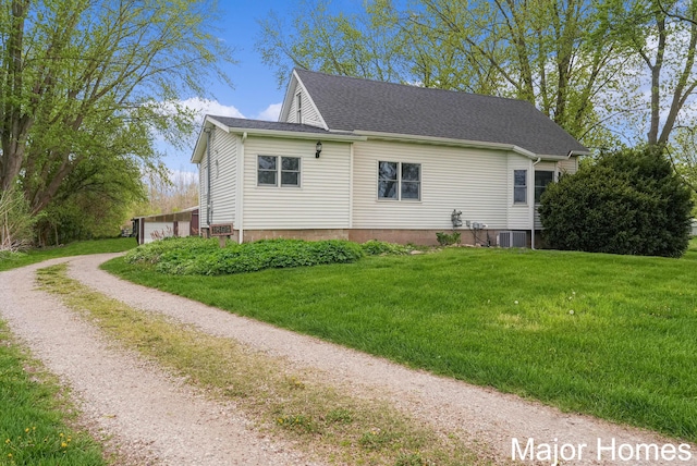 1864 92nd St SW, Byron Center, MI 49315 - view of side of property with a lawn, cooling unit, and roof with shingles