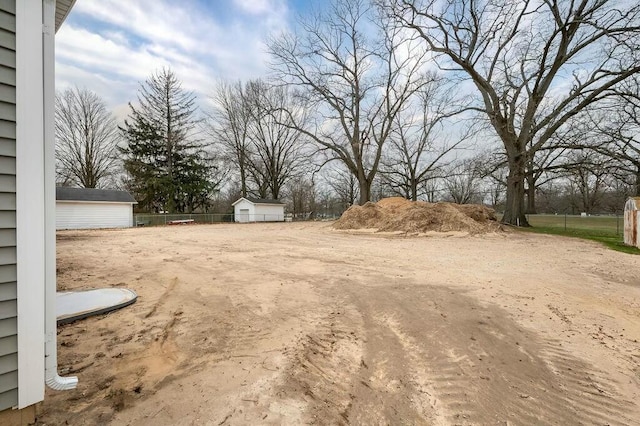 308 Hillview St, Buchanan, MI 49107 - view of yard with fence and an outdoor structure