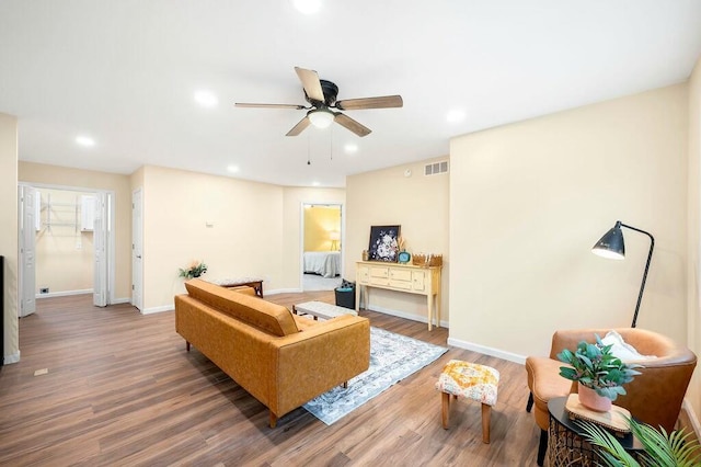 308 Hillview St, Buchanan, MI 49107 - living area featuring baseboards, recessed lighting, a ceiling fan, visible vents, and wood finished floors
