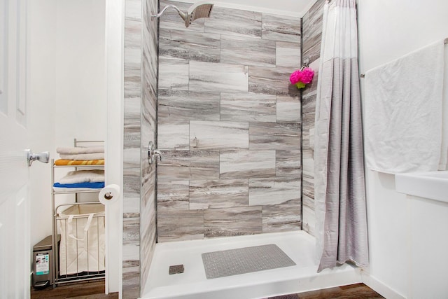 bathroom featuring a shower stall