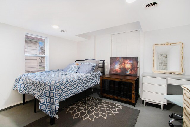 bedroom featuring visible vents