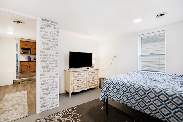 bedroom featuring visible vents