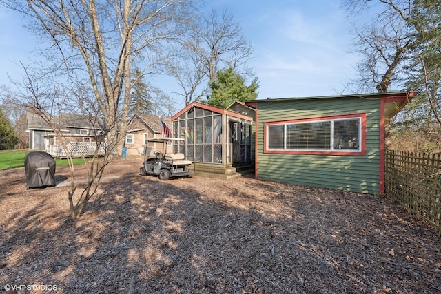 46353 Grand Beach Rd, Grand Beach, MI 49117 - view of yard featuring fence and a sunroom