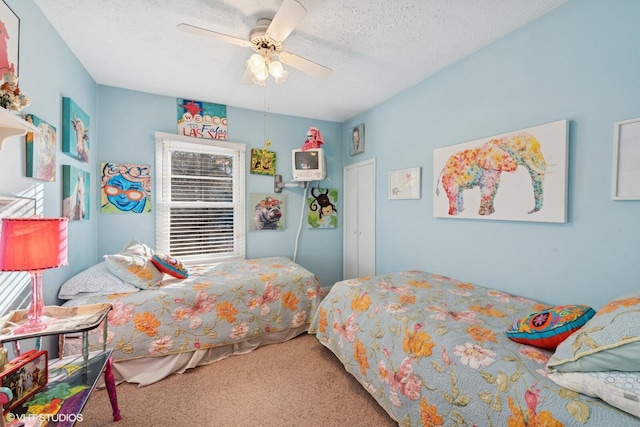 46353 Grand Beach Rd, Grand Beach, MI 49117 - bedroom featuring a textured ceiling, ceiling fan, and carpet floors