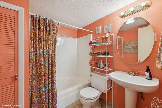 46353 Grand Beach Rd, Grand Beach, MI 49117 - full bathroom with shower / bath combination with curtain, toilet, tile patterned flooring, and a textured ceiling