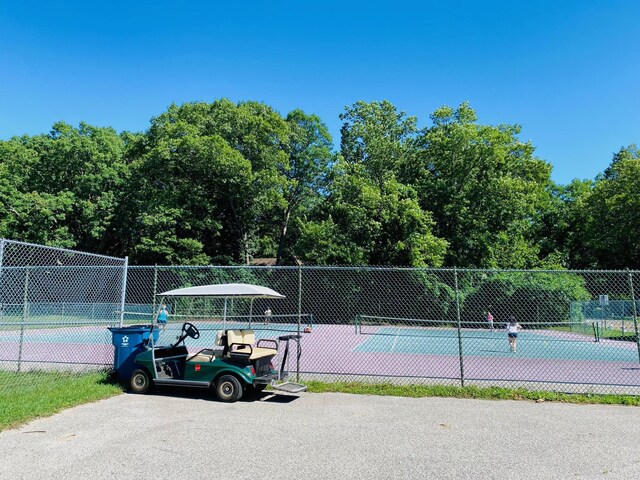 46353 Grand Beach Rd, Grand Beach, MI 49117 - view of tennis court featuring fence