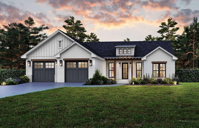 LOT9 Foster Ln, South Haven, MI 49090 - modern farmhouse style home with brick siding, an attached garage, a yard, and driveway