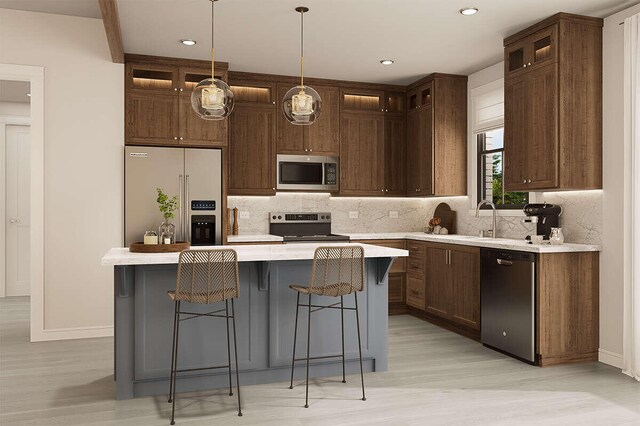LOT9 Foster Ln, South Haven, MI 49090 - kitchen with light wood-type flooring, a center island, light countertops, decorative backsplash, and appliances with stainless steel finishes