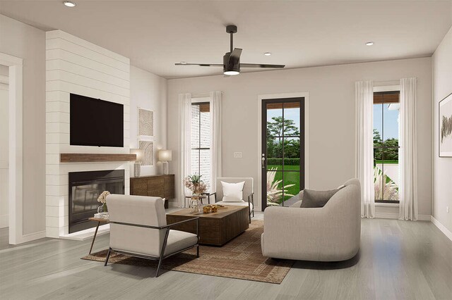 LOT9 Foster Ln, South Haven, MI 49090 - living area with baseboards, a ceiling fan, recessed lighting, wood finished floors, and a large fireplace