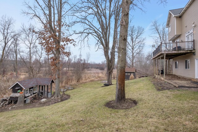 3969 Murray View Ave NE, Lowell, MI 49331 - view of yard featuring an outdoor structure and a wooden deck