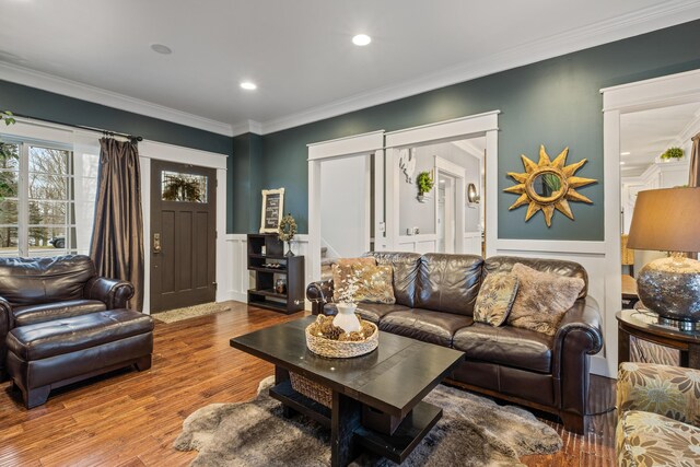 3969 Murray View Ave NE, Lowell, MI 49331 - living room featuring a decorative wall, ornamental molding, a wainscoted wall, recessed lighting, and wood finished floors