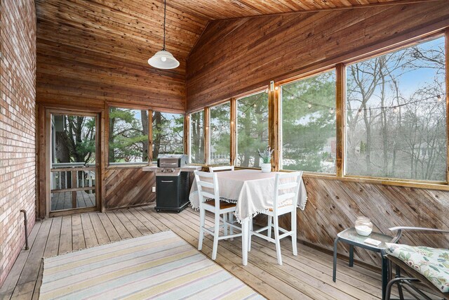 8170 Talaria Ter, Kalamazoo, MI 49009 - sunroom / solarium with high vaulted ceiling, wood walls, hardwood / wood-style flooring, a wooden deck, and wood ceiling