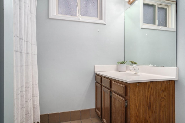 8170 Talaria Ter, Kalamazoo, MI 49009 - full bathroom with vanity and tile patterned floors