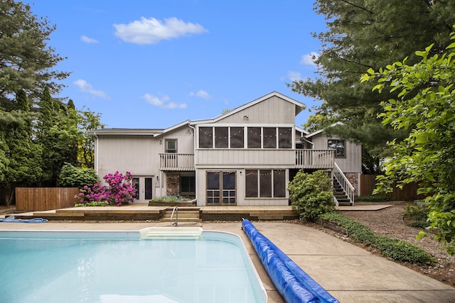 8170 Talaria Ter, Kalamazoo, MI 49009 - back of house featuring a sunroom, french doors, stairs, and a covered pool