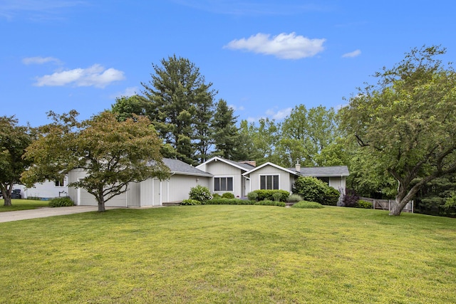 8170 Talaria Ter, Kalamazoo, MI 49009 - view of front of home with driveway, an attached garage, and a front lawn