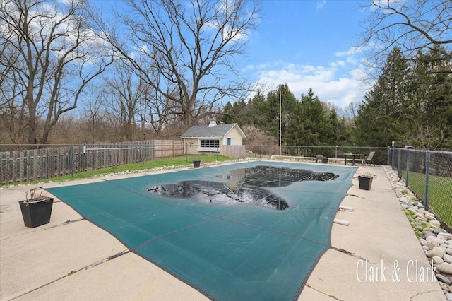 view of pool with a patio area, a fenced backyard, and a fenced in pool
