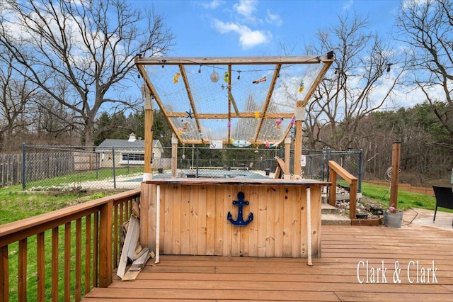 wooden deck featuring fence