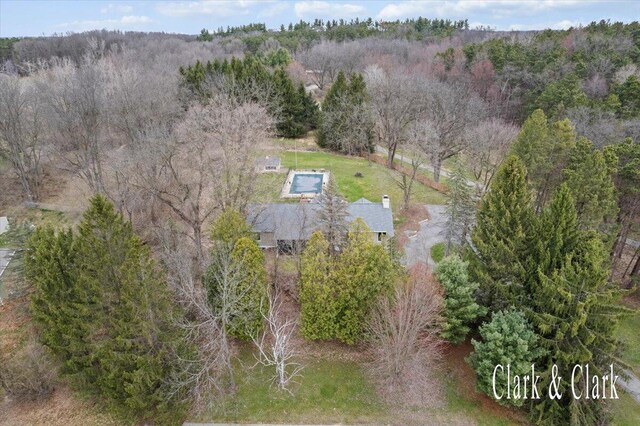 aerial view with a wooded view