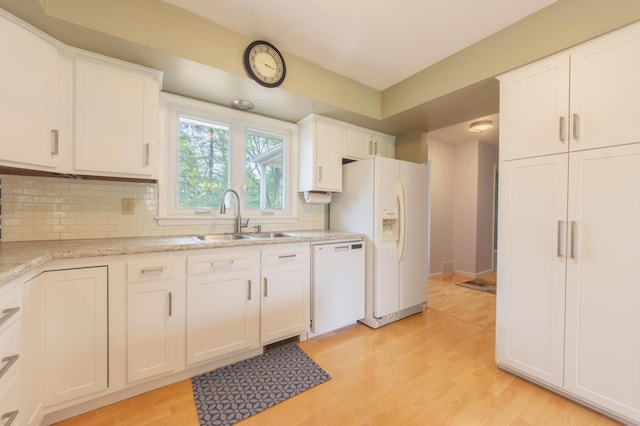 3010 Hill An Brook Dr, Portage, MI 49024 - kitchen with white appliances, a sink, decorative backsplash, and white cabinets