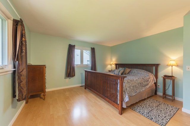 3010 Hill An Brook Dr, Portage, MI 49024 - bedroom with wood finished floors and baseboards