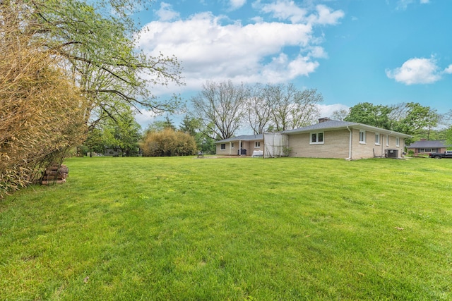 3010 Hill An Brook Dr, Portage, MI 49024 - view of grassy yard featuring cooling unit