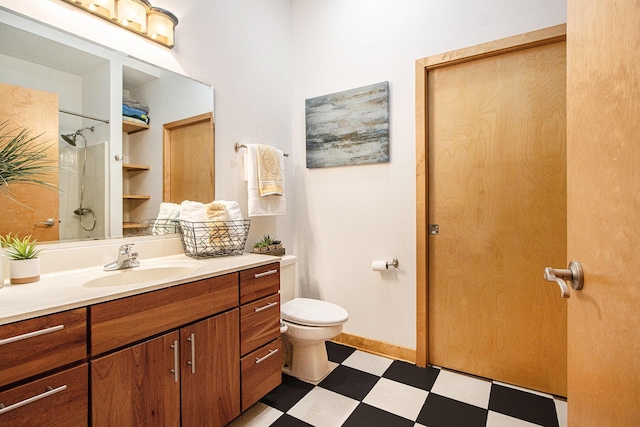 full bath with a shower, tile patterned floors, vanity, and toilet