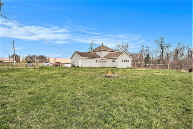13627 Cadmus Rd, Hudson, MI 49247 - exterior space with a front lawn and fence