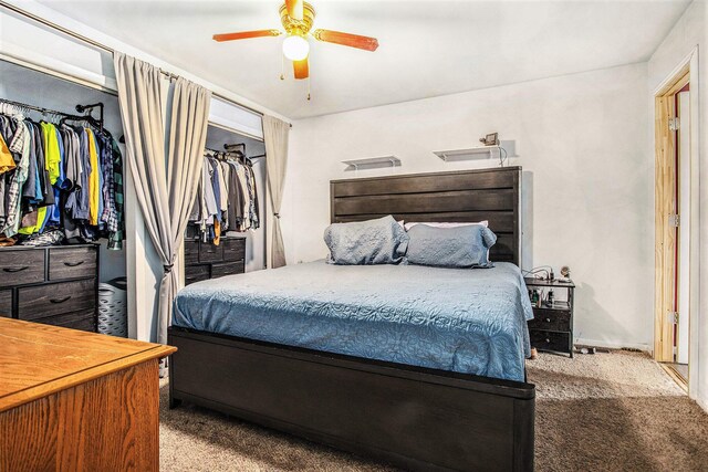13627 Cadmus Rd, Hudson, MI 49247 - bedroom with ceiling fan and carpet floors