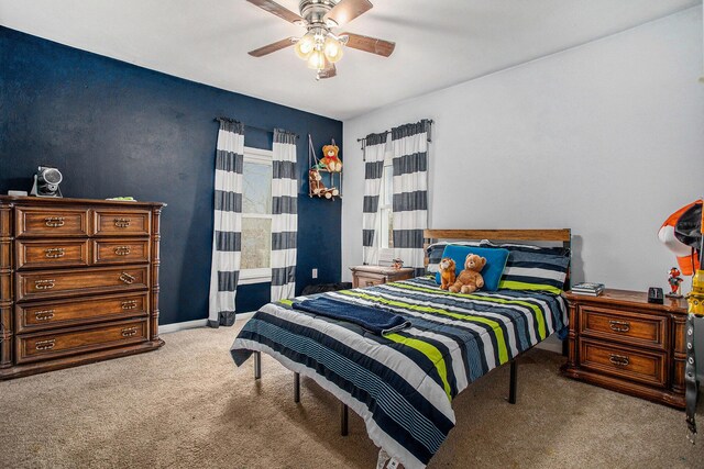 13627 Cadmus Rd, Hudson, MI 49247 - bedroom featuring baseboards, a ceiling fan, and carpet flooring