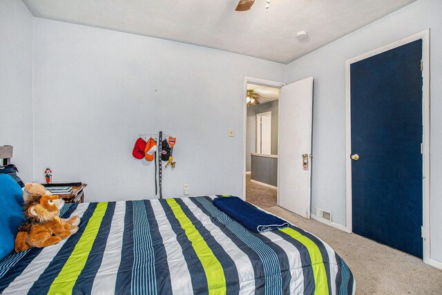 13627 Cadmus Rd, Hudson, MI 49247 - bedroom featuring a ceiling fan, visible vents, and carpet floors