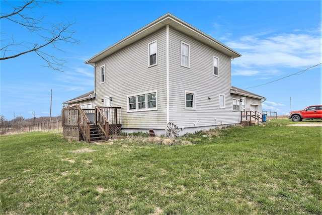 13627 Cadmus Rd, Hudson, MI 49247 - rear view of house featuring a yard and a deck