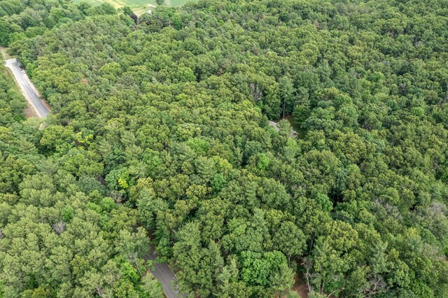 8702 E 98th St, Howard City, MI 49329 - aerial view of property and surrounding area with a forest